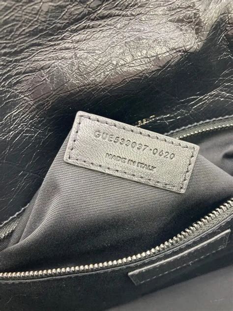 fake ysl cardholder|ysl bag serial number.